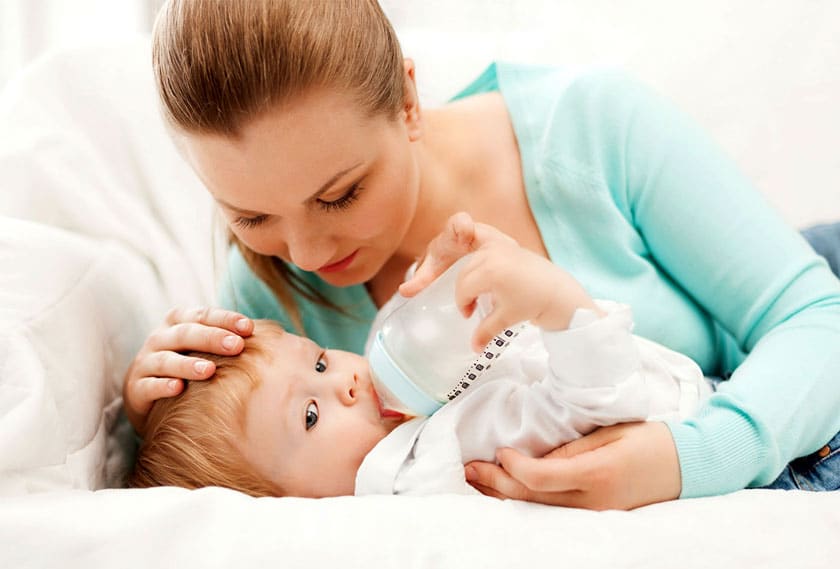 baby eating breast milk
