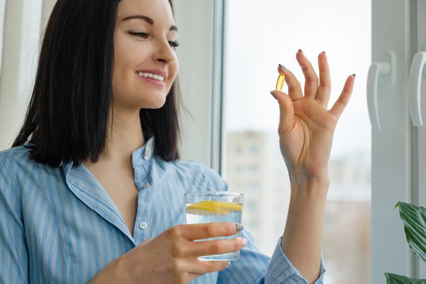 woman taking supplements